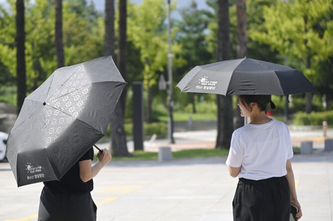 양산 펴고 도로 식히고, 달성군의 ‘...